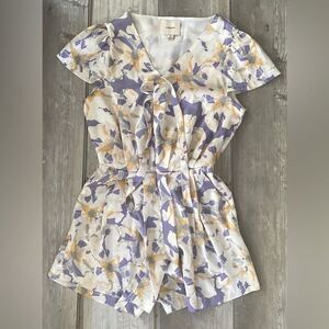 Purple Floral Romper
Madeline Hum of Things to Come
Sz S